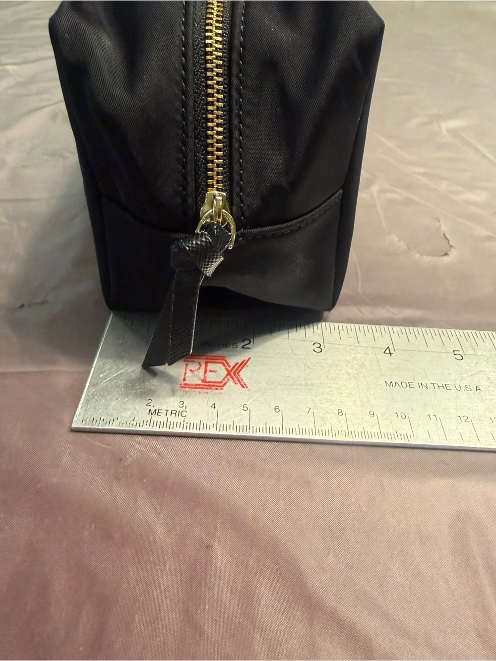 kate spade Black Nylon Cosmetic Pouch with Gold Logo Plaque